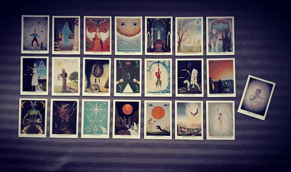 A spread of the 22 cards from The Frownstrong Tarot deck/